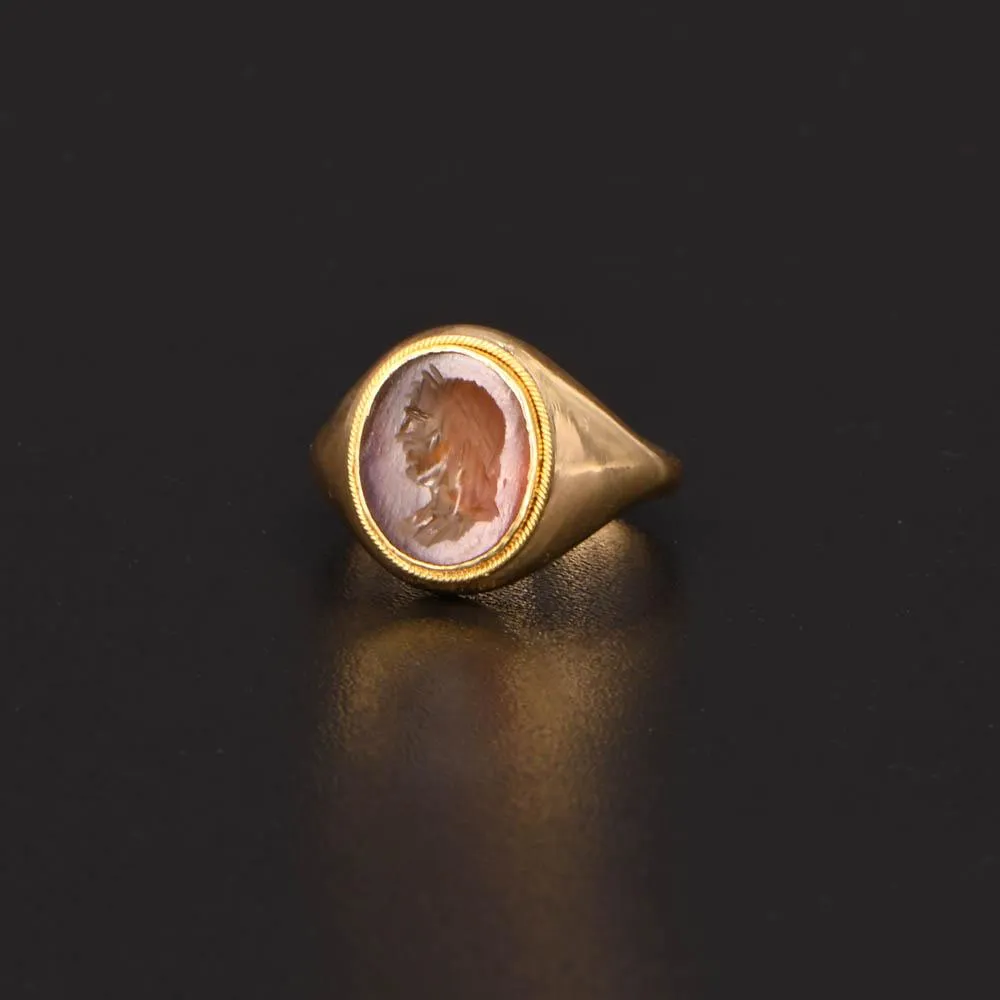 A Roman Carnelian Ringstone Intaglio of Apollo, Roman Imperial Period, ca. 1st - 2nd century CE