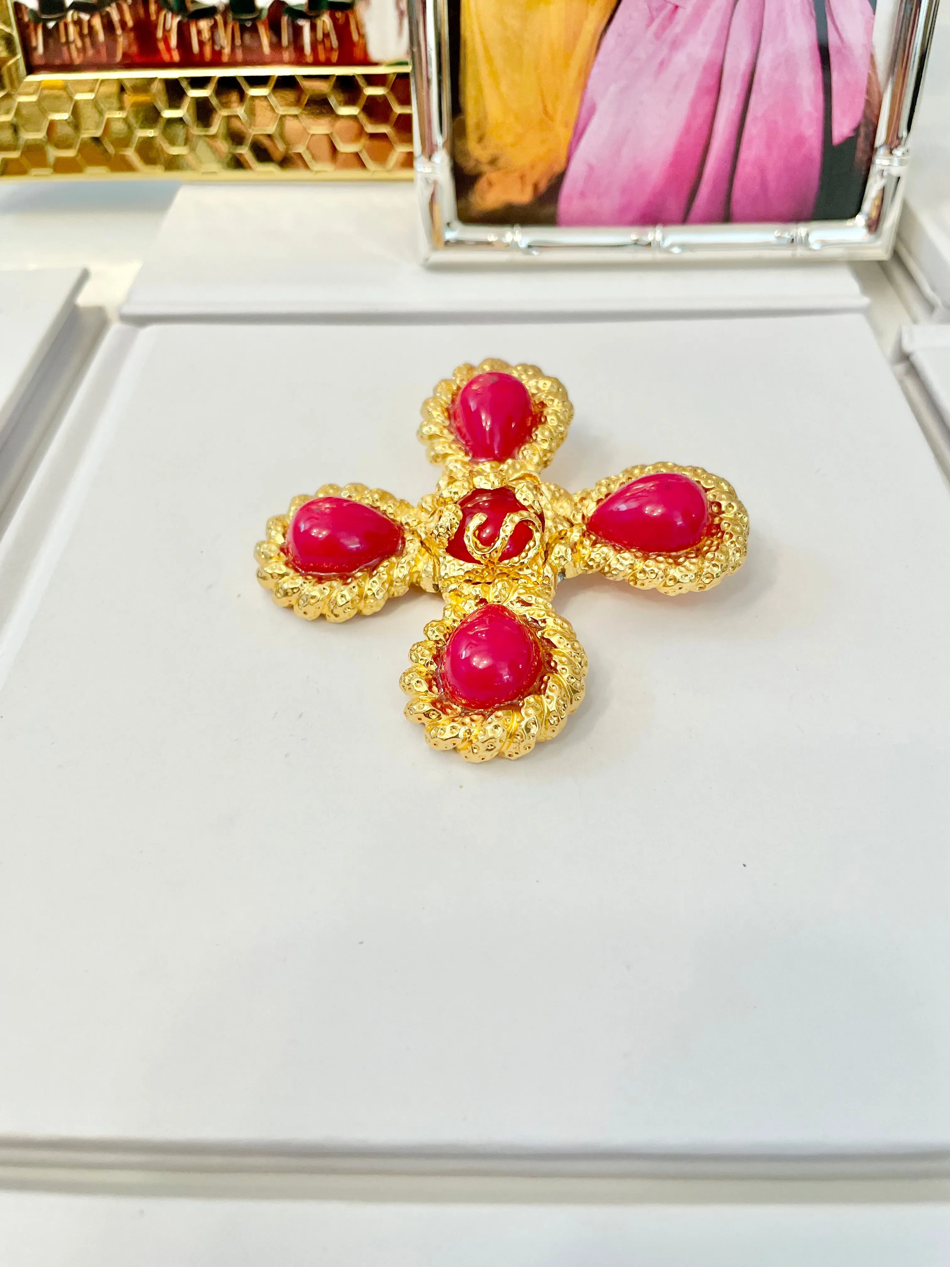 A truly classy St. John hot pink Maltese cross brooch.... so chic