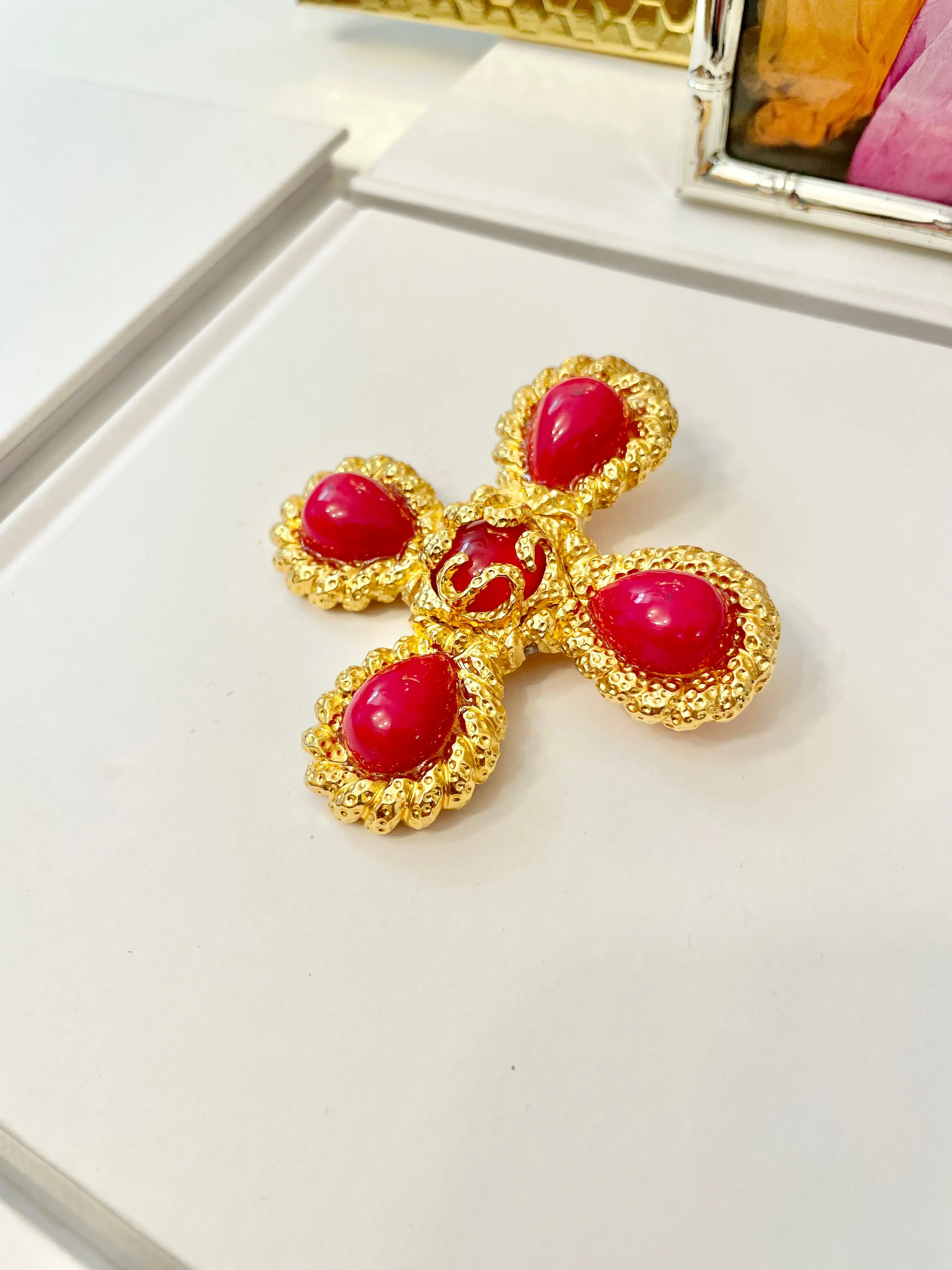 A truly classy St. John hot pink Maltese cross brooch.... so chic