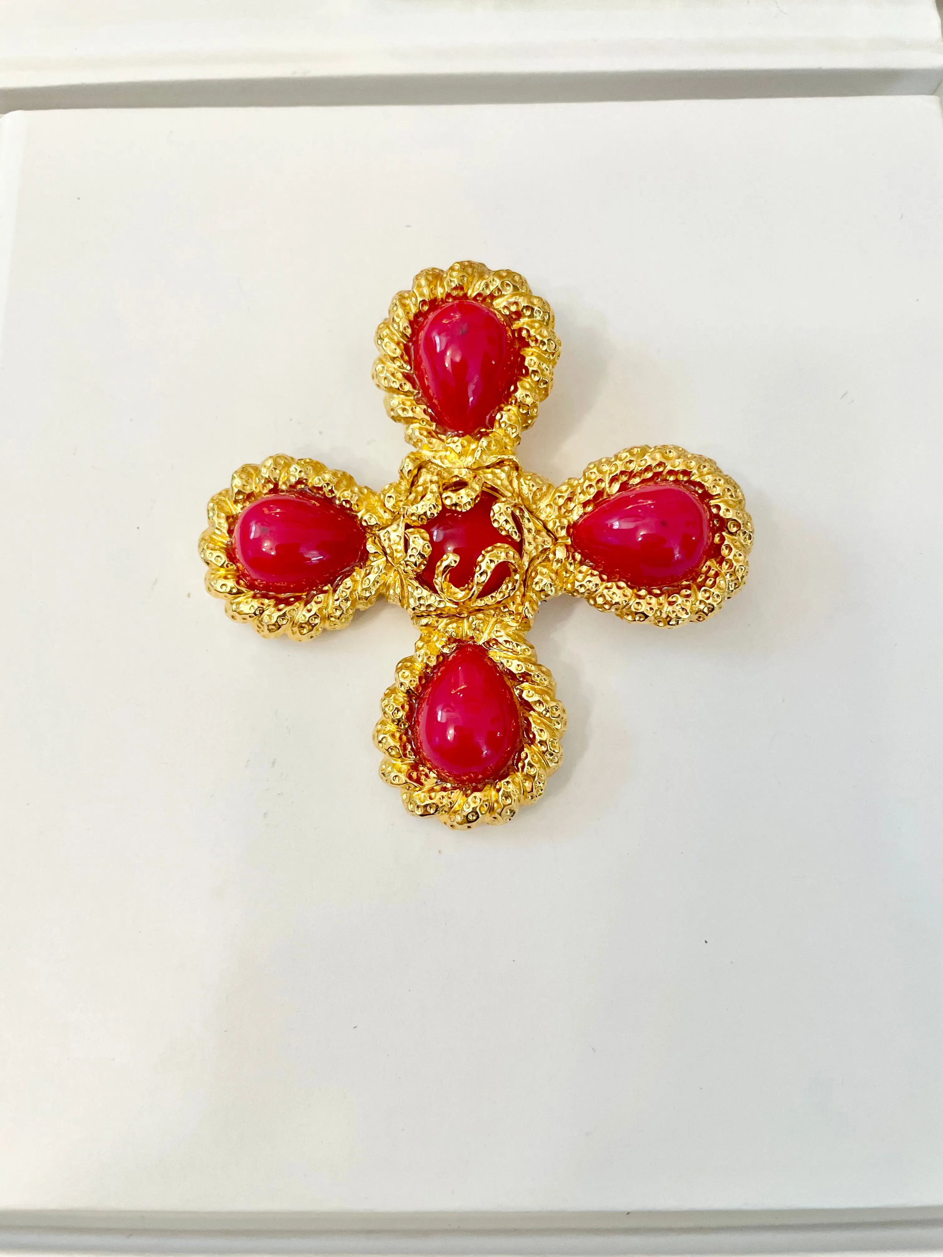 A truly classy St. John hot pink Maltese cross brooch.... so chic