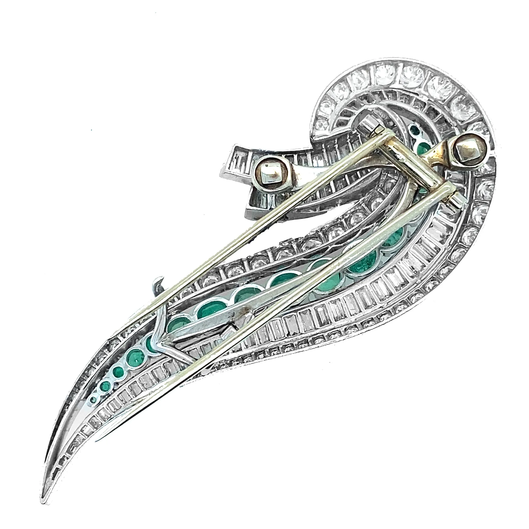 An Art Déco platinum, diamond and emerald brooch. 1935 circa